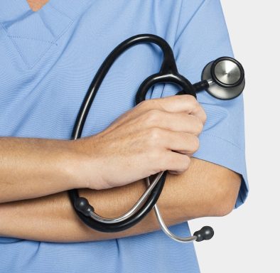 Doctors hand holding a stethoscope closeup